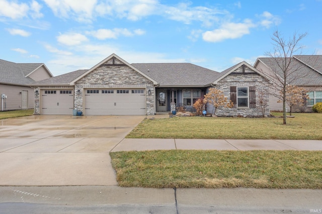 view of front of property with a garage and a front yard