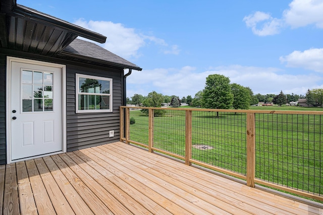 deck featuring a lawn