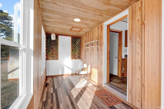 interior space featuring a wealth of natural light and wood ceiling