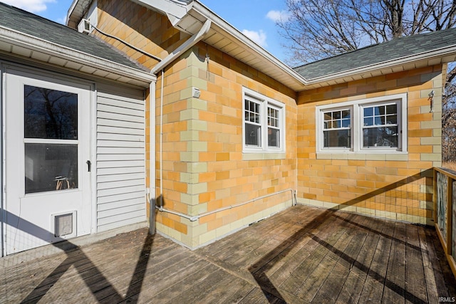 view of side of property with a deck