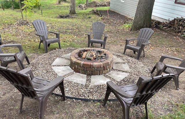 view of patio with an outdoor fire pit