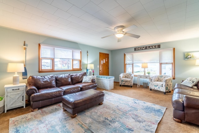 living room with carpet and ceiling fan