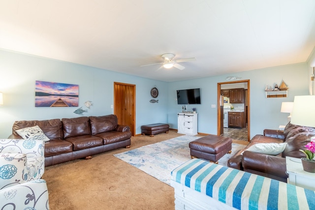 living room with carpet floors and ceiling fan