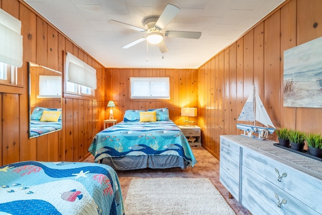 bedroom with light colored carpet and ceiling fan