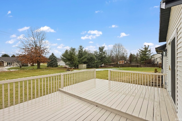 deck featuring a yard