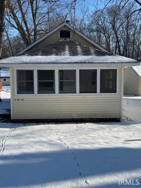 view of snow covered property