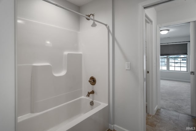 bathroom featuring shower / tub combination and tile patterned floors