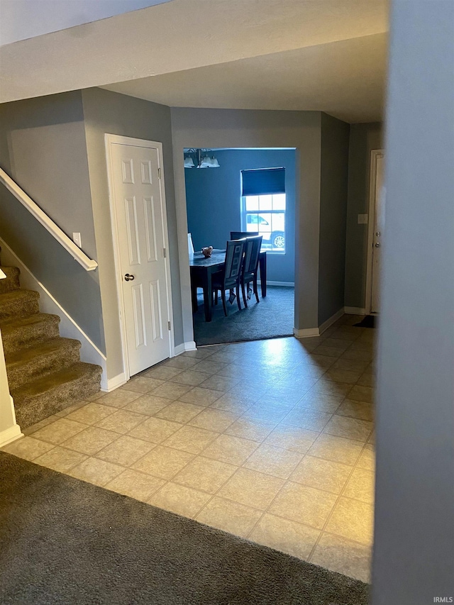 hallway with light carpet