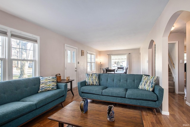 living room with dark hardwood / wood-style floors