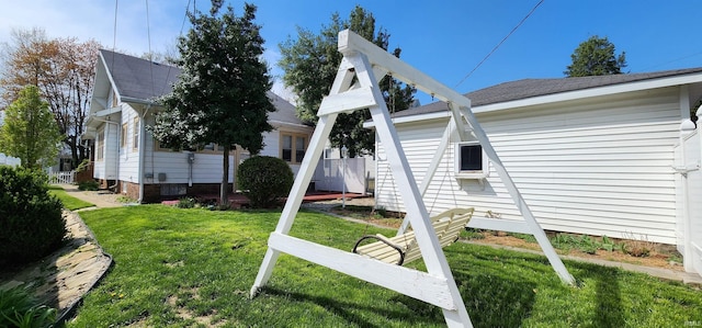 208 NE 10th St, Washington, IN 47501 - view of side of property featuring a yard