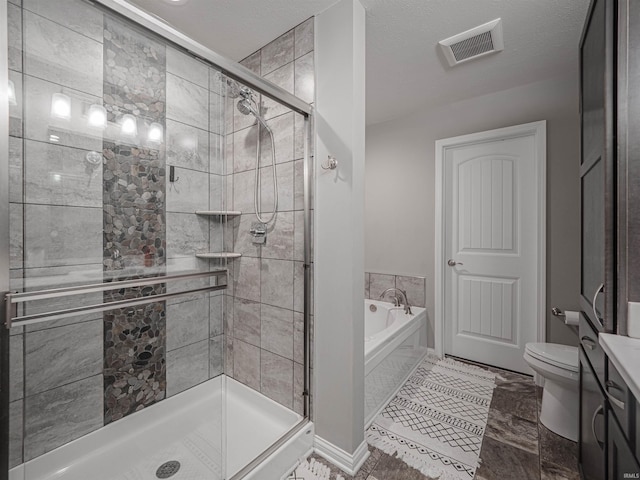 bathroom featuring toilet, shower with separate bathtub, and a textured ceiling