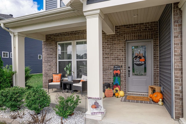 entrance to property with covered porch