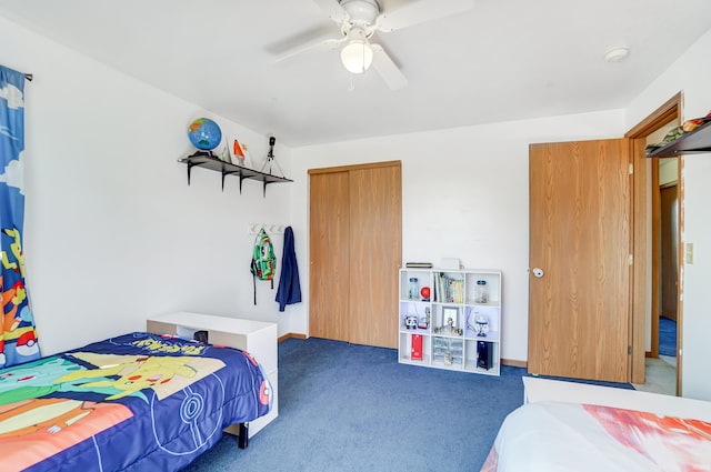 bedroom featuring dark colored carpet and ceiling fan