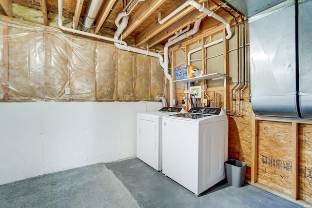 washroom with washer and dryer