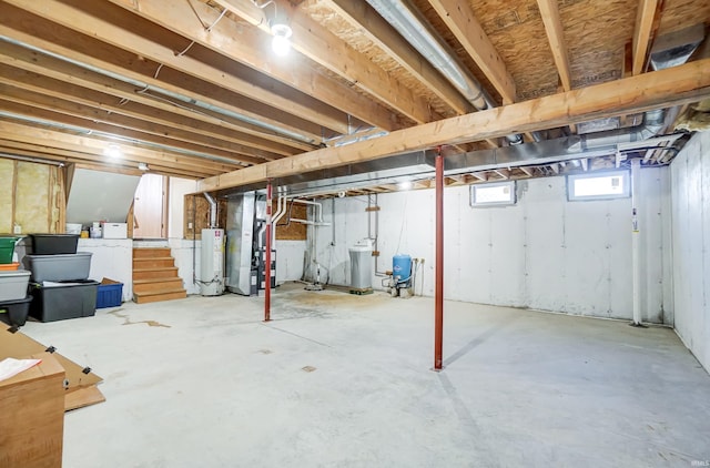 basement with water heater and heating unit