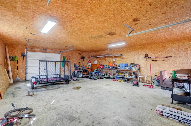 garage with a workshop area