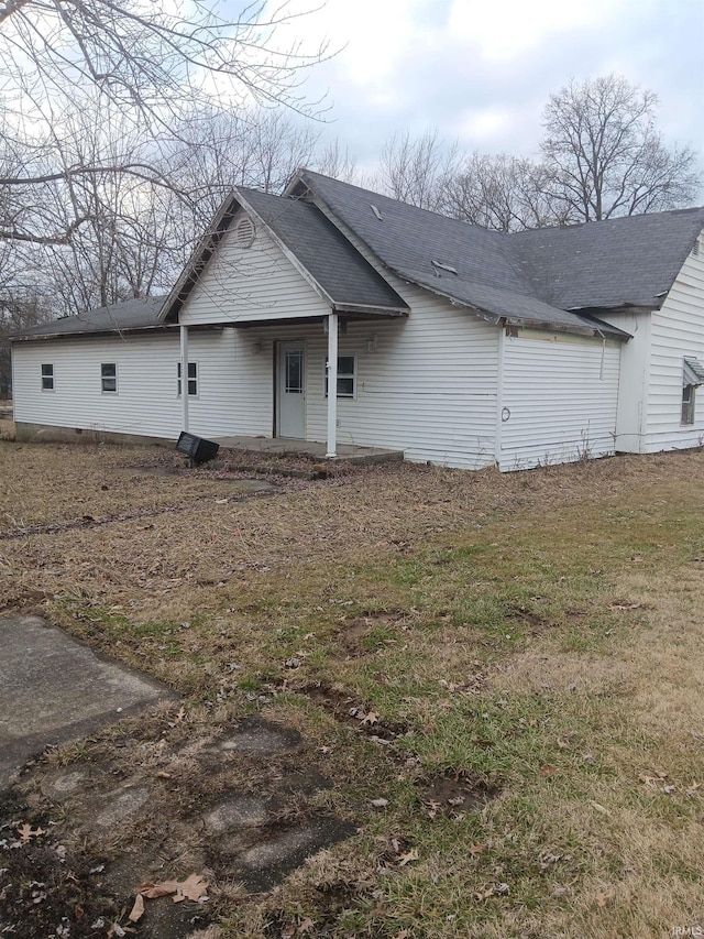 exterior space with a yard