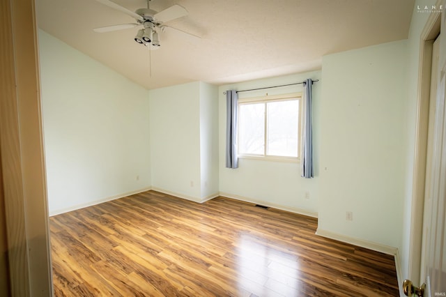 unfurnished room with ceiling fan and light wood-type flooring