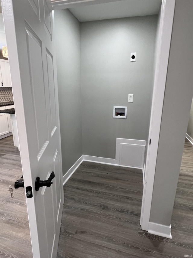 washroom with washer hookup, dark hardwood / wood-style floors, and electric dryer hookup