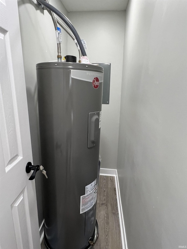 utility room with water heater