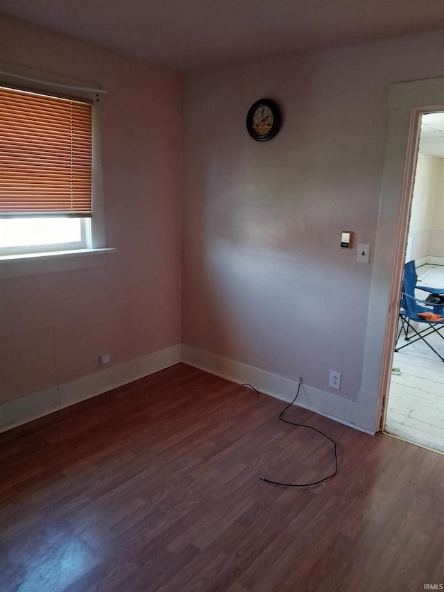 unfurnished room featuring hardwood / wood-style floors