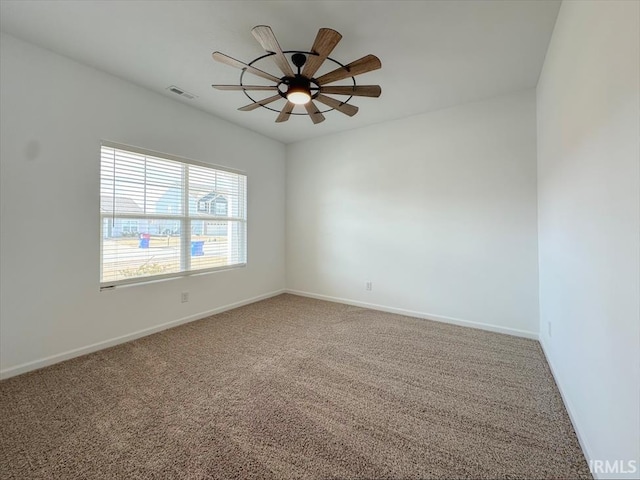 carpeted empty room with ceiling fan