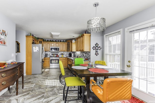 dining area featuring sink