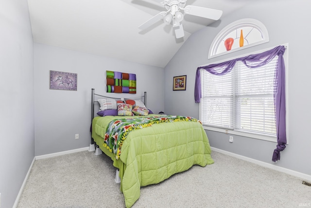 carpeted bedroom featuring lofted ceiling and ceiling fan