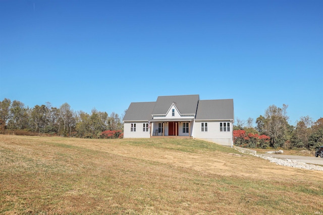 view of front of home with a front yard and a porch