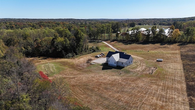 birds eye view of property with a rural view