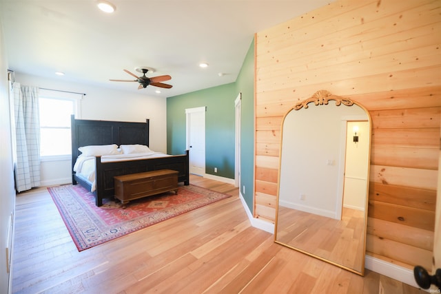 bedroom featuring light hardwood / wood-style flooring and ceiling fan