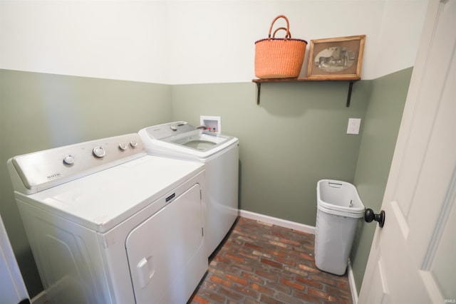 washroom with separate washer and dryer