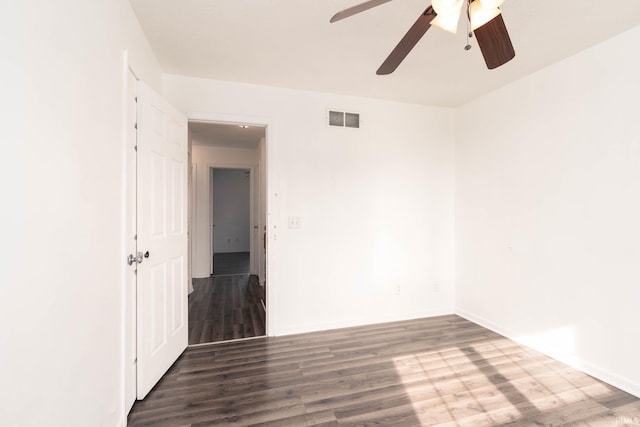 unfurnished room featuring hardwood / wood-style flooring