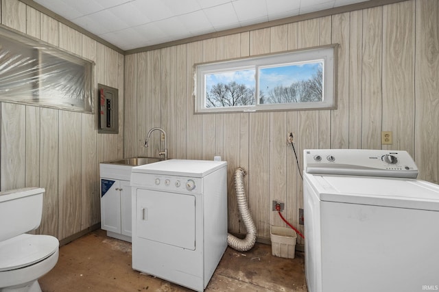 laundry area with electric panel and sink