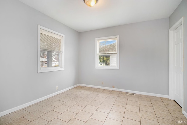 view of tiled spare room