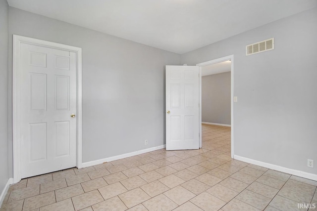 view of tiled empty room