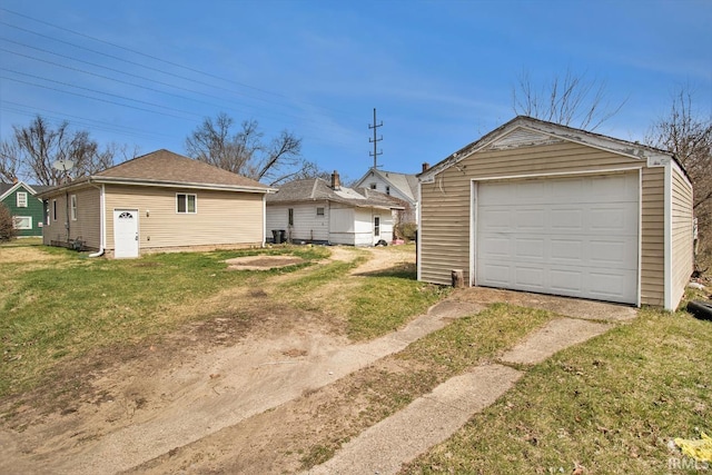 garage with a yard