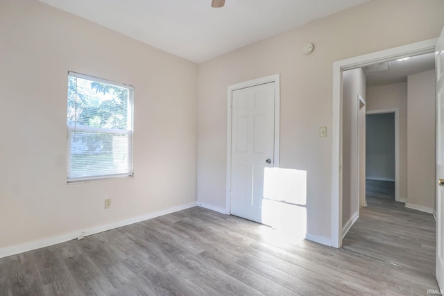 unfurnished bedroom with light hardwood / wood-style floors