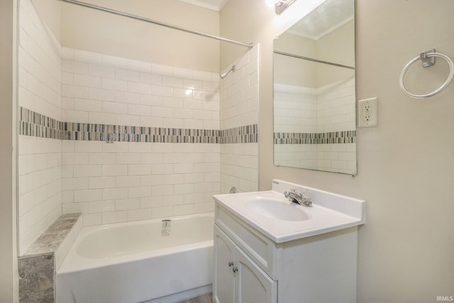 bathroom featuring vanity and tiled shower / bath combo