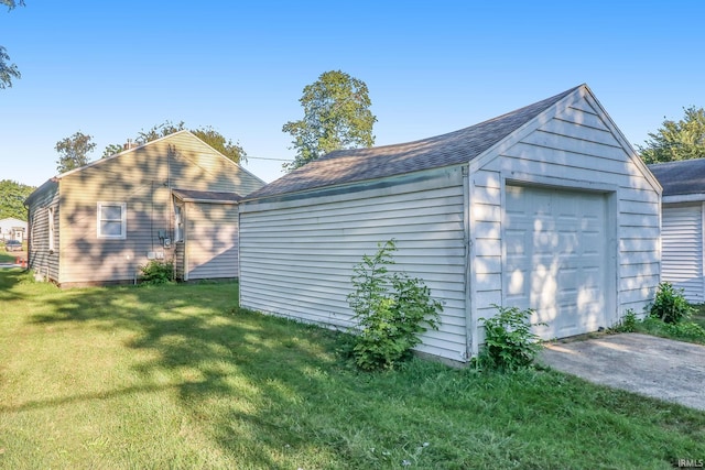 garage with a yard