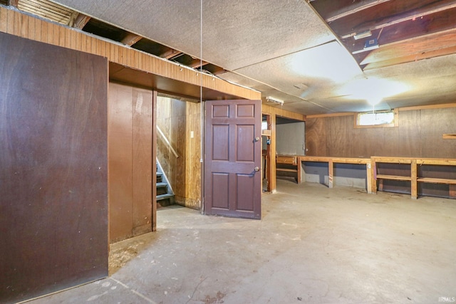 basement with wood walls