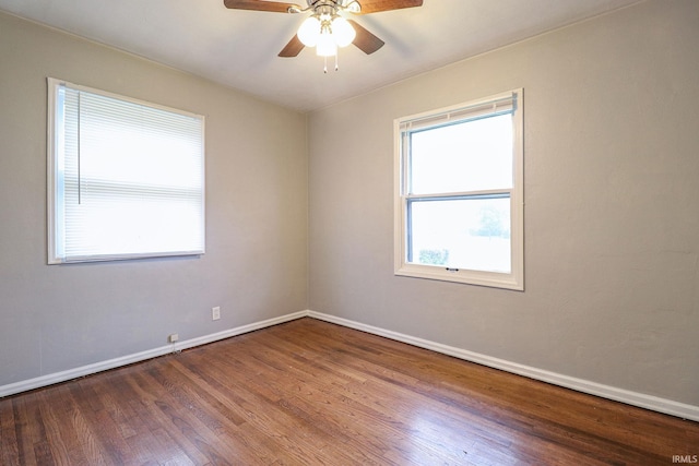 unfurnished room featuring hardwood / wood-style flooring and ceiling fan