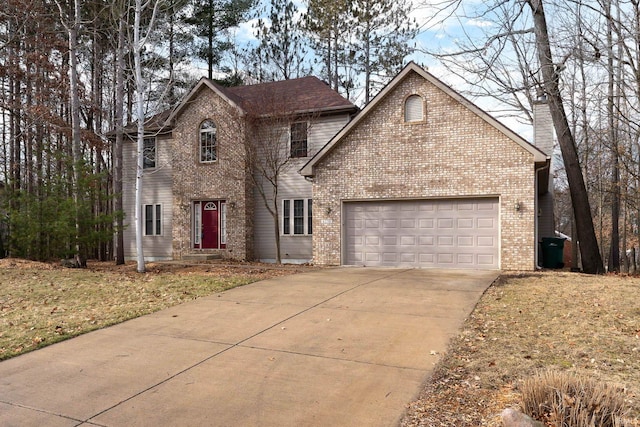 front of property with a garage