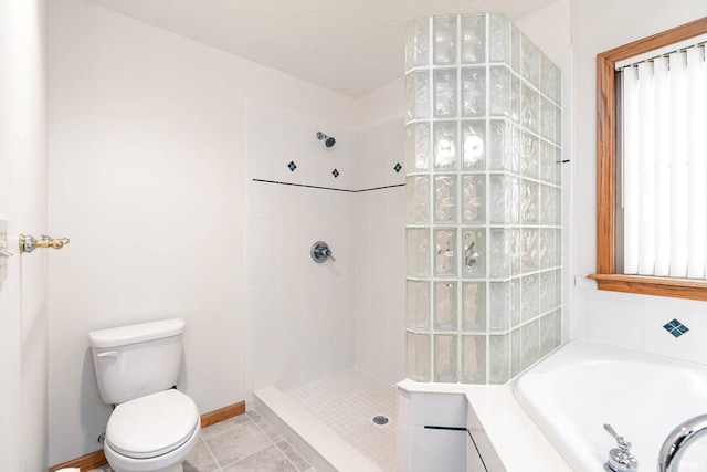 bathroom featuring tile patterned flooring, a textured ceiling, independent shower and bath, and toilet