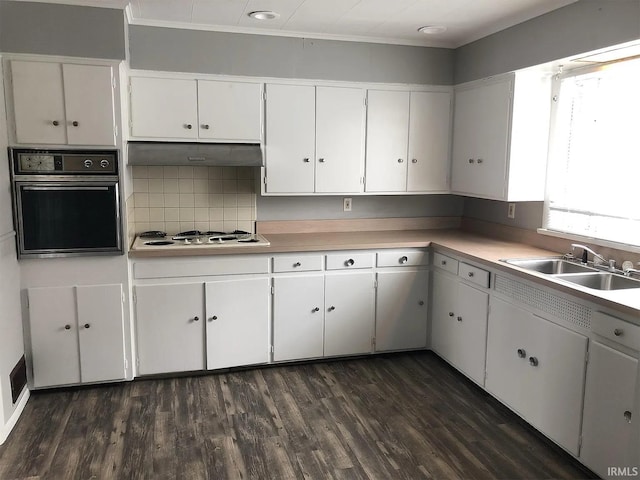 kitchen with sink, white cabinetry, white gas cooktop, dark hardwood / wood-style flooring, and black oven