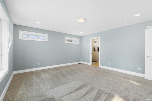 view of carpeted spare room