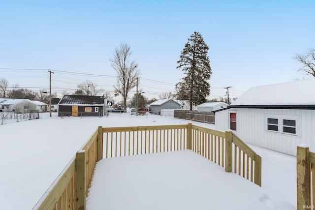 view of snow covered deck