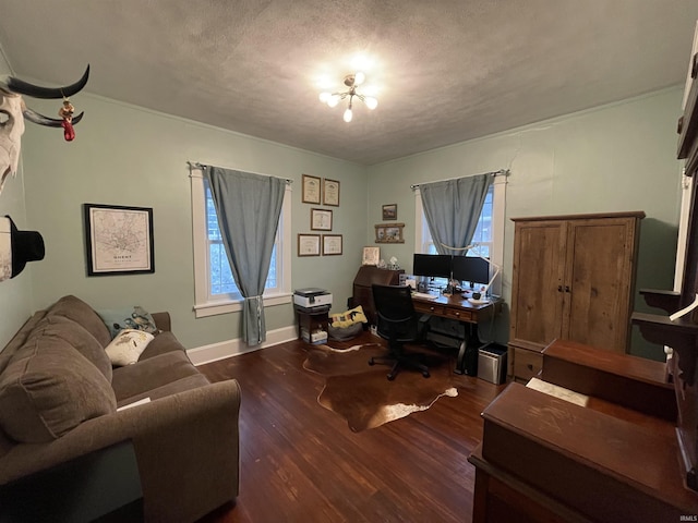 office area featuring dark hardwood / wood-style floors, a chandelier, and a textured ceiling