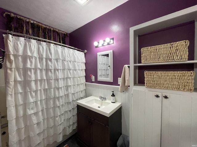 bathroom with vanity and walk in shower