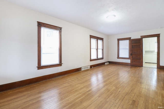 empty room featuring light hardwood / wood-style flooring